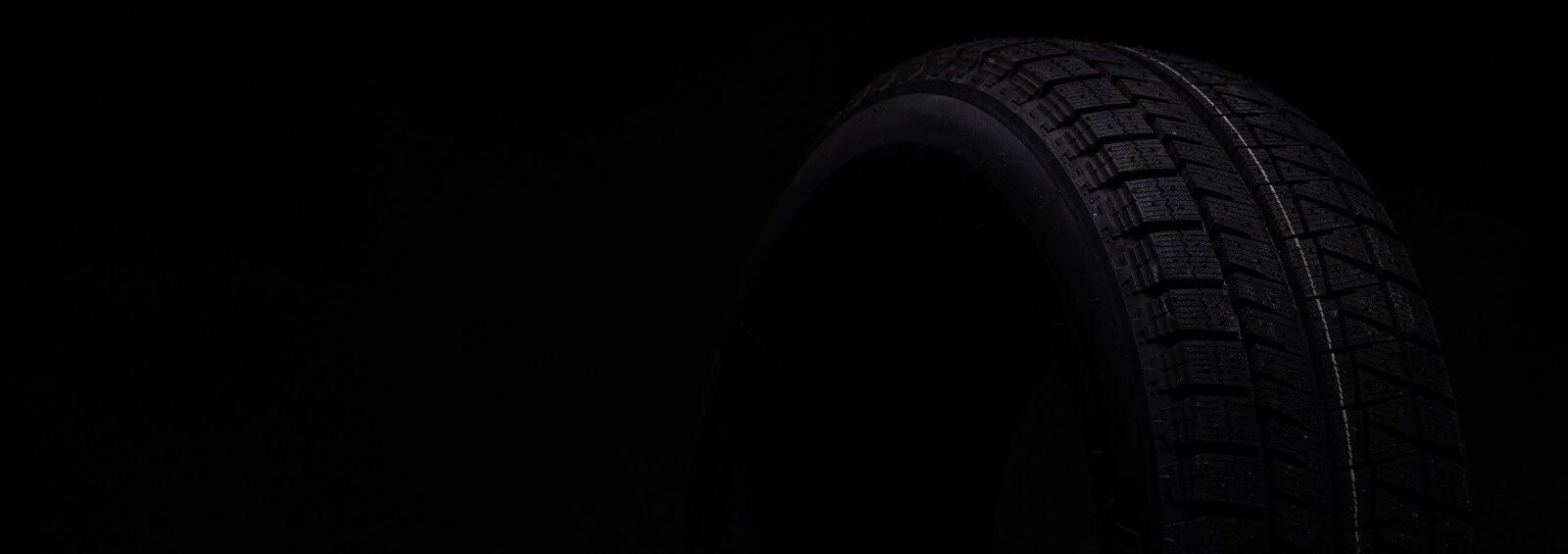 black tire on black isolated background.